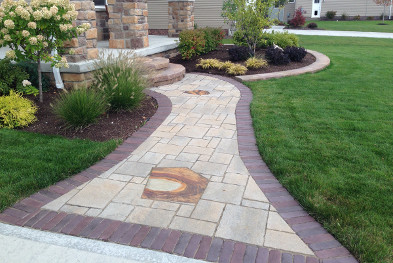 Stone entryway by Frate Landscaping, Inc.